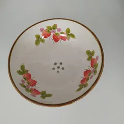 Bord met rode aardbeien- en bloemmotief, bruin randje, gezien van bovenaf