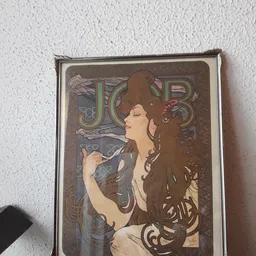 Art Nouveau-stijl schilderij met vrouwelijk portret en decoratieve letters JOB