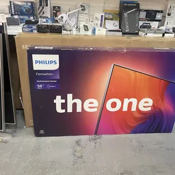 Philips Fernseher 'the one' in originele verpakking op kringloopwinkelvloer