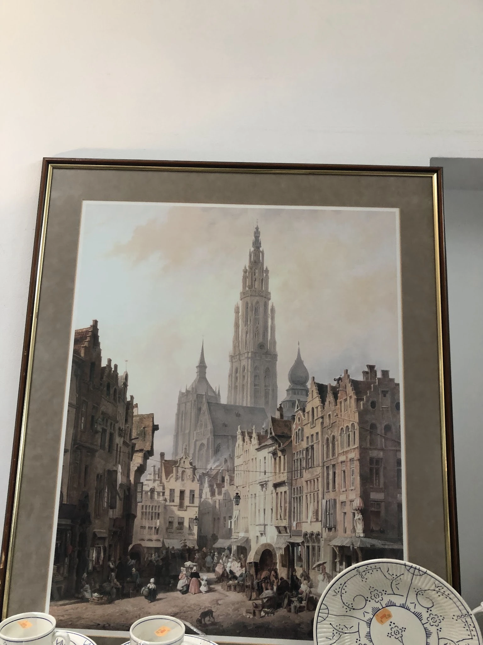 Ingelijste aquarel of schilderij van een Europese stad met kathedraal en historische gebouwen