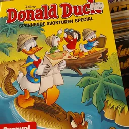 Donald Duck strip 'Spannende avonturen special' met illustraties van eendenfiguren in jungle-achtige omgeving