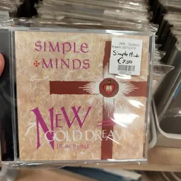 Simple Minds cd 'New Gold Dream' met prijssticker in kringloopwinkel