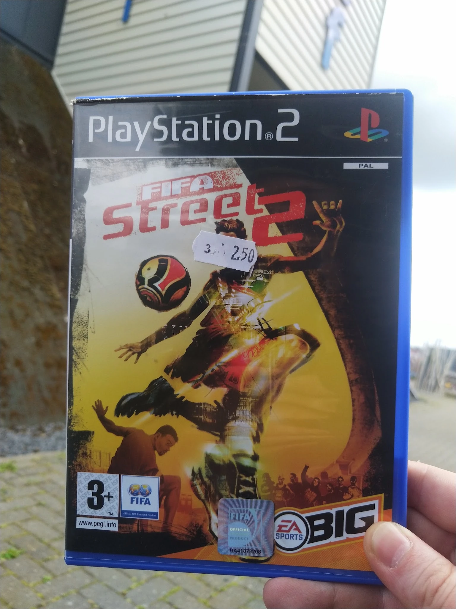 PlayStation 2-spel FIFA Street 2 in verpakking