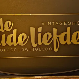 Gouden logo-ontwerp met tekst 'de Oude liefde' en 'vintageshop' op bruine achtergrond
