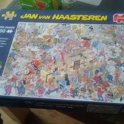 Jan van Haasteren puzzel van 1000 stukjes in verpakking op display