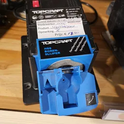 Topcraft HSS boorsleuper in blauwe verpakking met prijskaartje op houten ondergrond