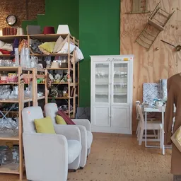 Winkelinterieur met houten stellingen vol glazen en serviesgoed, witte fauteuils, kledingrek en witte kast met glazen deuren