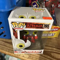 Funko Pop figuur van Ultraman in verpakking, close-up foto