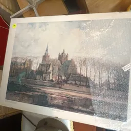 Ingelijste kunstprint van een kathedraal aan een waterkanaal met bomen