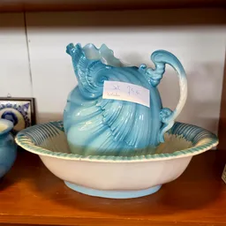 Turquoise porseleinen kandelaar met bijpassend schaaltje, met prijskaartje
