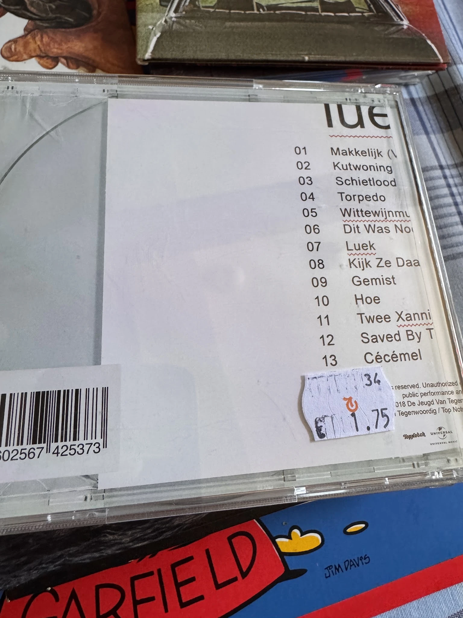 Tracklijst met nummers en artiestennamen, mogelijk van een muziekalbum of afspeellijst