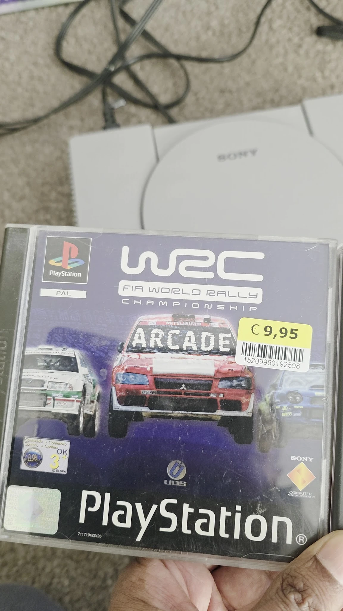 PlayStation-spel WRC FIA World Rally Championship in doosje met prijssticker van €9,95