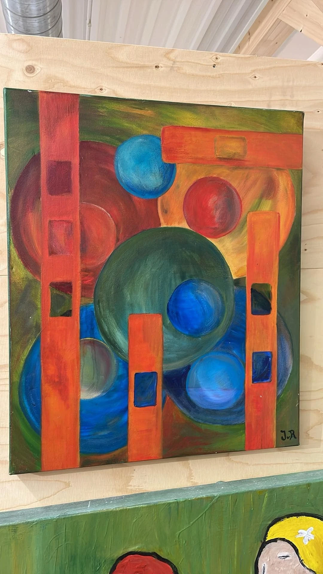 Abstract schilderij met geometrische vormen in rode, blauwe, groene en oranje kleuren
