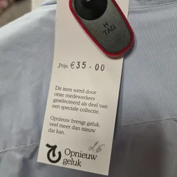 Prijskaartje met prijs €35.00 en Nederlandse tekst over een artikel uit een speciale collectie