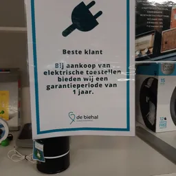 Informatiebord met garantieverklaring voor elektrische toestellen van de winkel