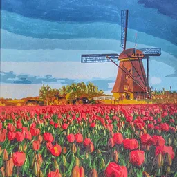 Schilderij van een Nederlands landschap met tulpenveld, windmolen en blauwe lucht