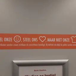 Oranje banner met Nederlandse tekst over duurzaamheid en veiligheidsinstructies