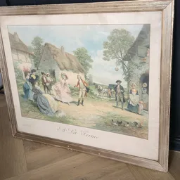 Ingelijste historische prent van een dorpsscène met mensen en dieren uit de 19e eeuw