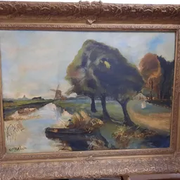 Schilderij in gouden lijst met landschapsmotief: polder met water, bomen en molens