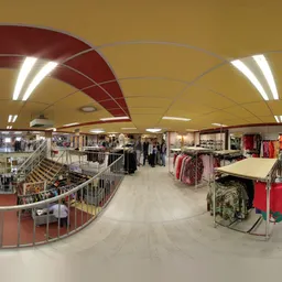 Winkelvloer van kringloopwinkel met kleding op rekken, trappen en winkelafdelingen onder rode en grijze plafondpanelen met ve